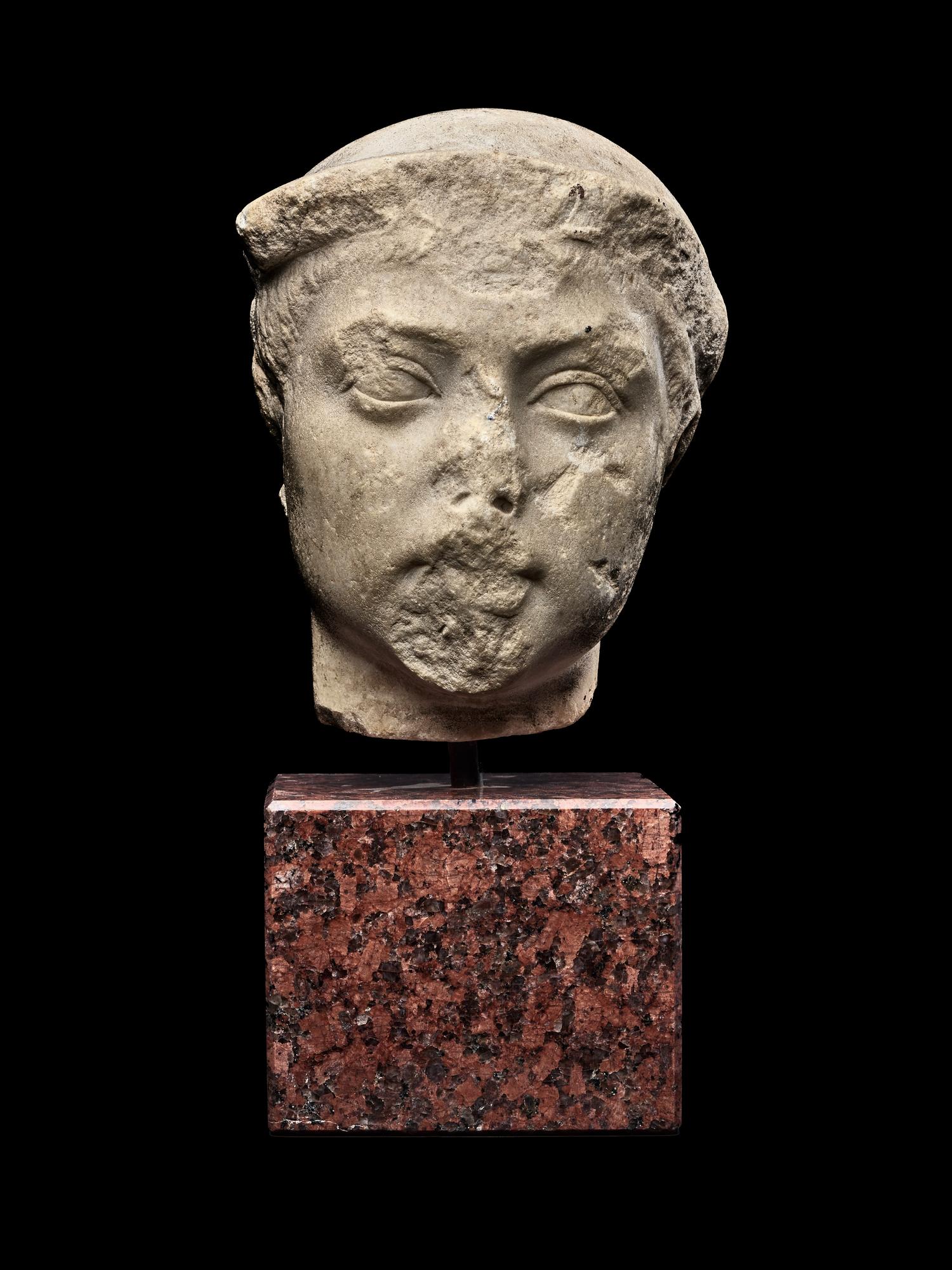A Roman Marble Head of the God Mercury