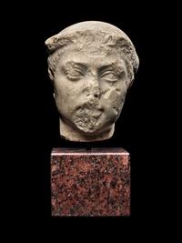 A Roman Marble Head of the God Mercury
