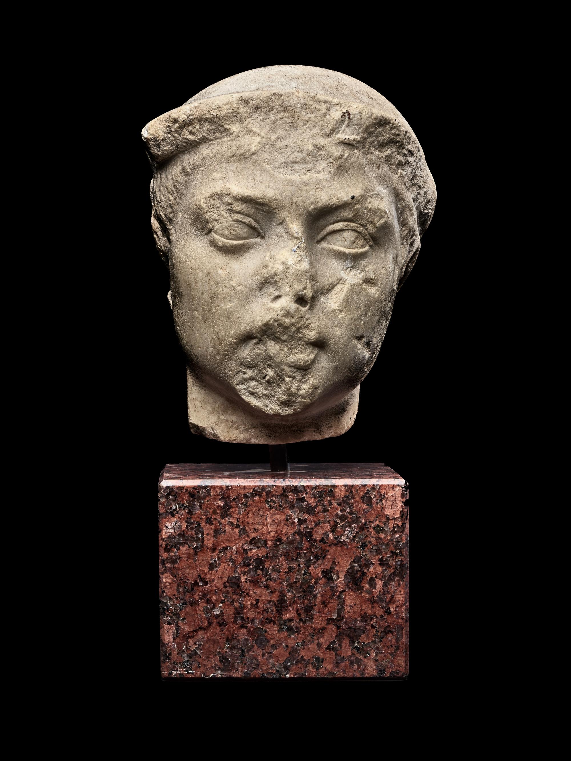A Roman Marble Head of the God Mercury