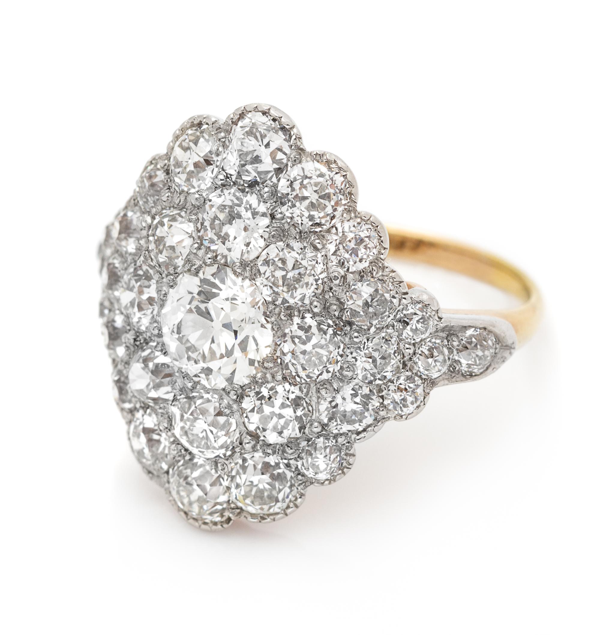 An Edwardian Platinum Topped Gold and Diamond Ring, 4.50 dwts.