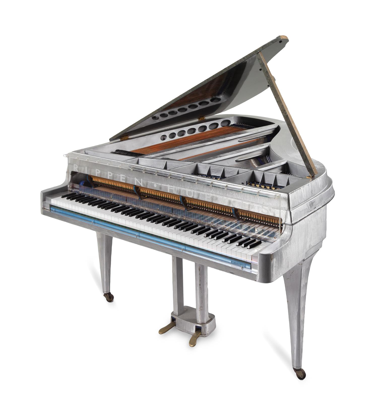 A Henk Hupkes Aluminum and Maplewood Piano