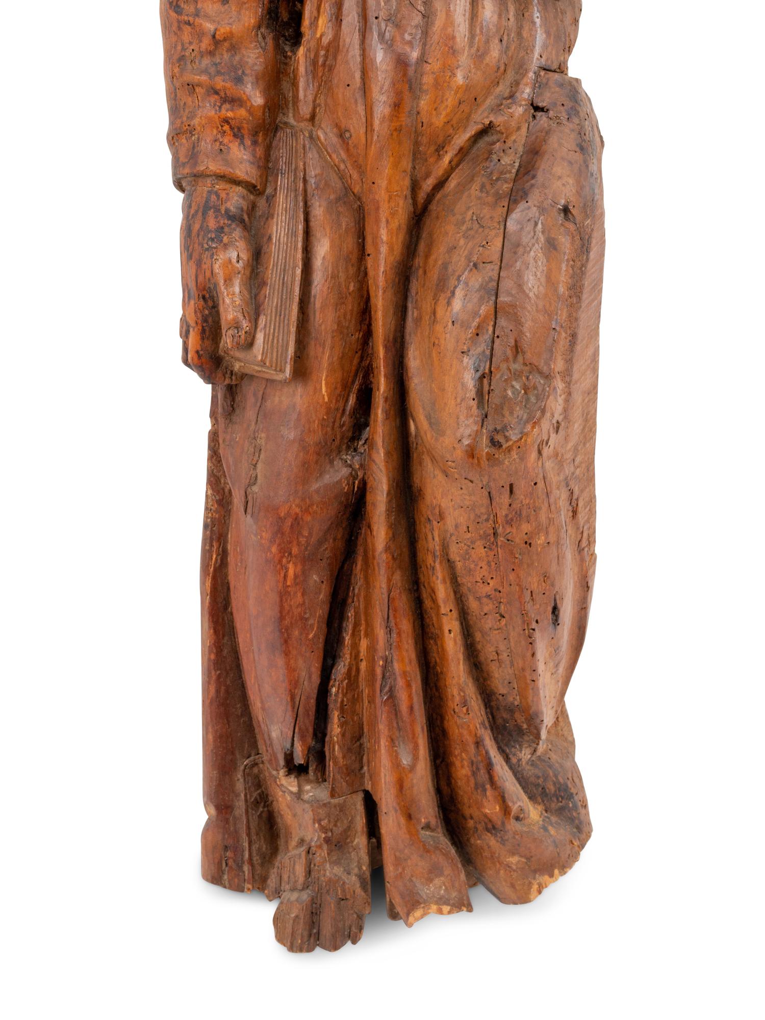 An Italian Carved Wood Figural Appliqué of a Saint