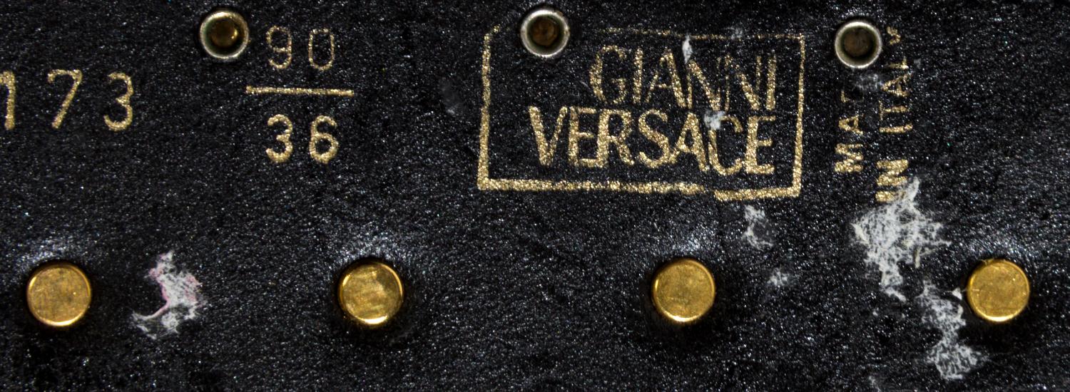 A Gianni Versace Black Leather Belt, Size 90/36.