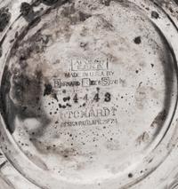A Group of Three Silver-Plate Cocktail Shakers