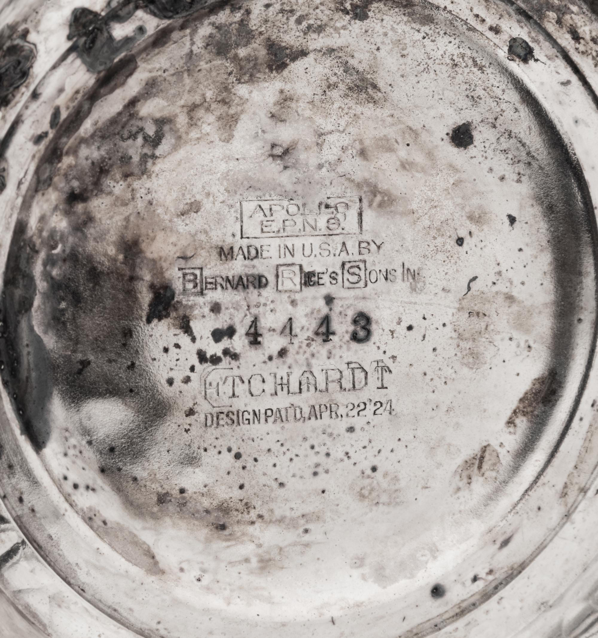 A Group of Three Silver-Plate Cocktail Shakers