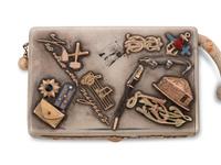 A Russian Silver and Applied Gold and Enamel Charm Decorated Cigarette Case