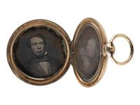 [EARLY PHOTOGRAPHY]. 11 lockets containing daguerreotypes and tintypes.