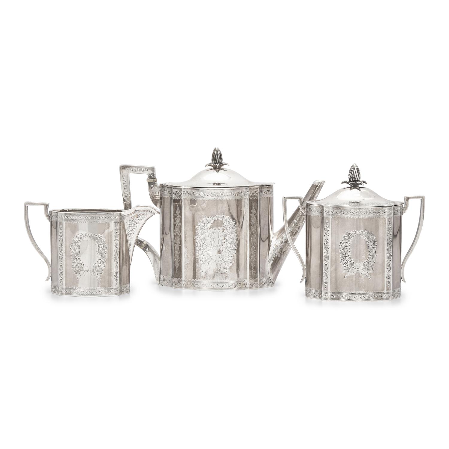A Three-Piece Coin Silver Tea Service