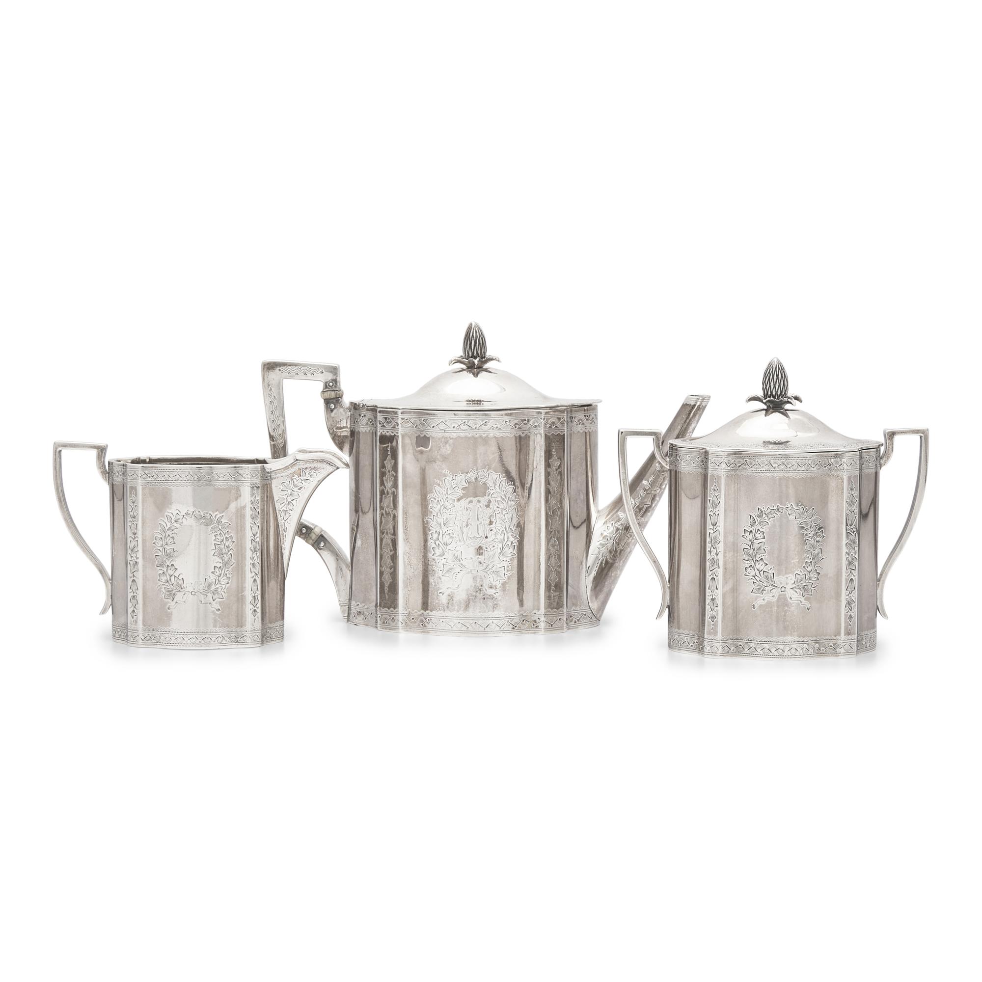A Three-Piece Coin Silver Tea Service
