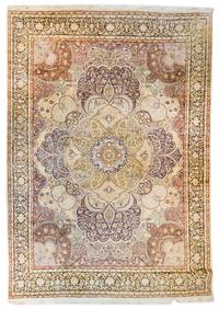 A Tabriz Wool Rug 12 feet 1 1/2 inches x 9 feet 1 inch.
