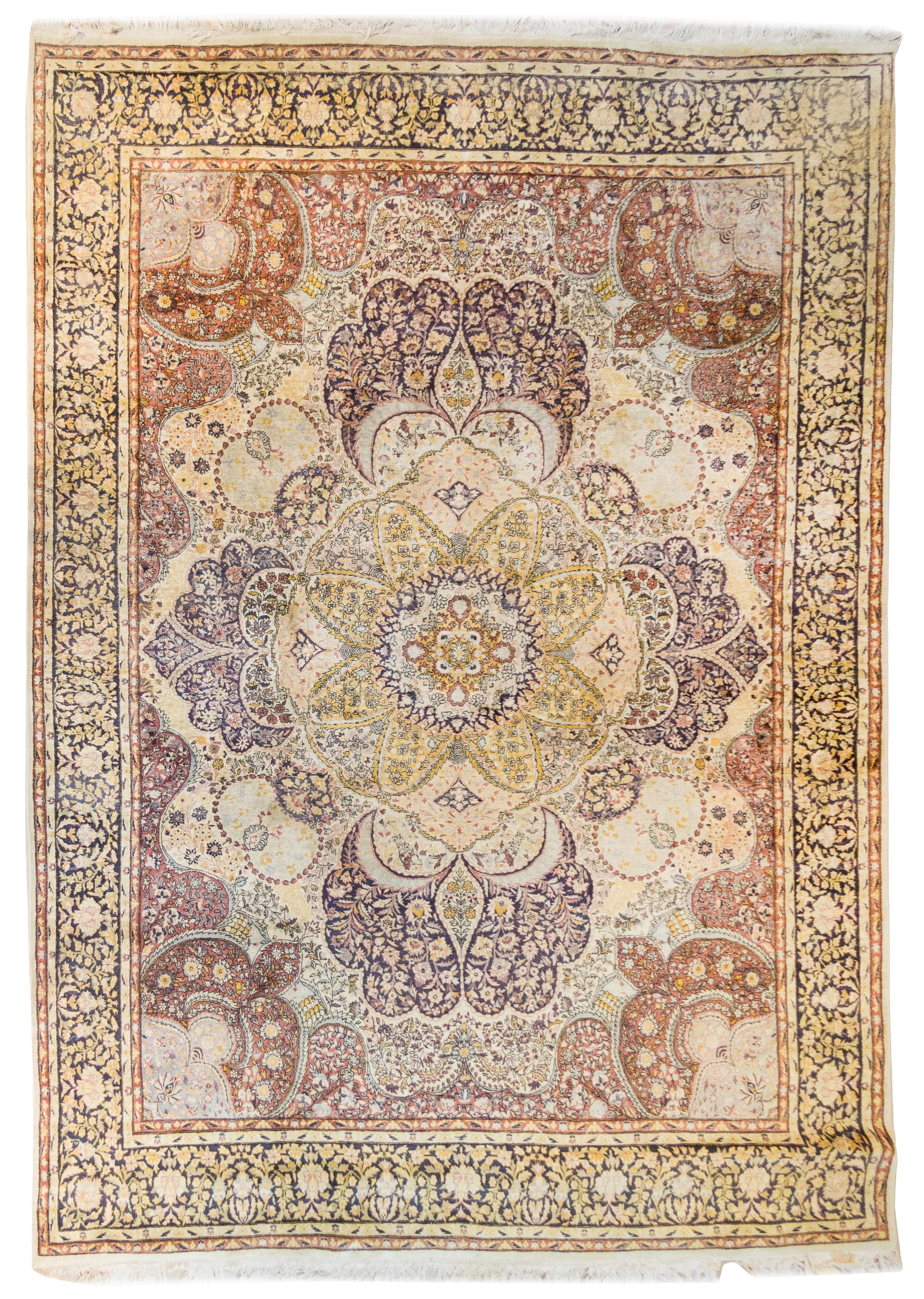 A Tabriz Wool Rug 12 feet 1 1/2 inches x 9 feet 1 inch.