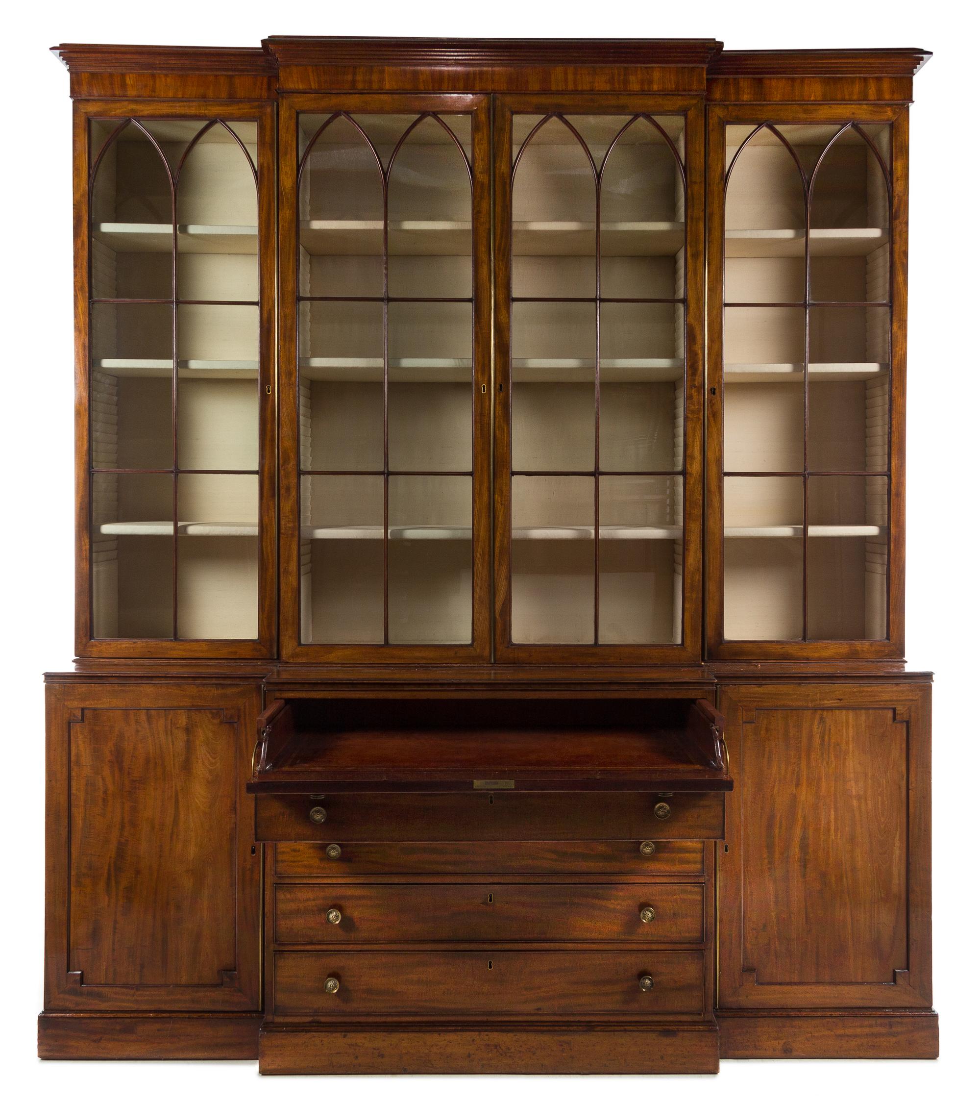 A George III Mahogany Breakfront Secretary Bookcase Height 97 x width 85 x depth 19 1/4 inches. — MANNER OF THOMAS SHERATON, CIRCA 1780