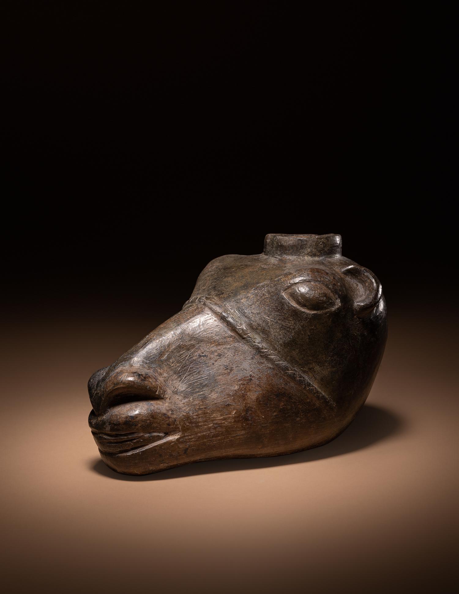 A Chimu Blackware Llama Head