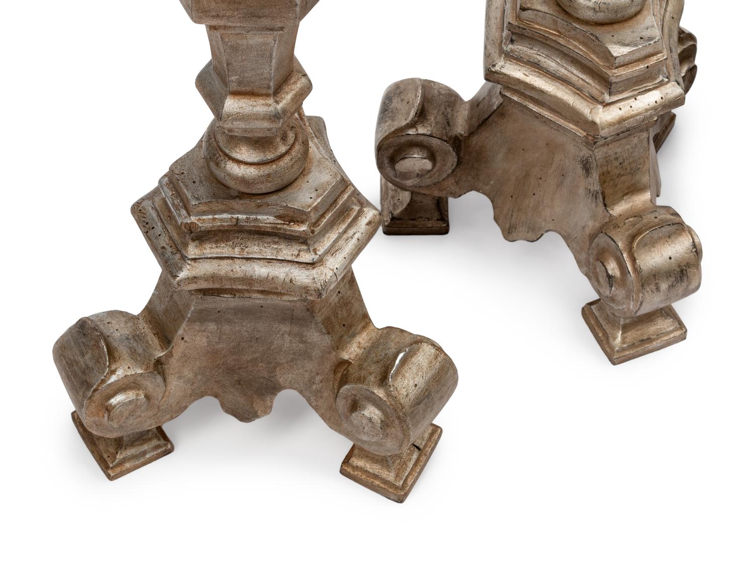 A Set of Four Northern European Gilt and Silvered Wood Candlesticks