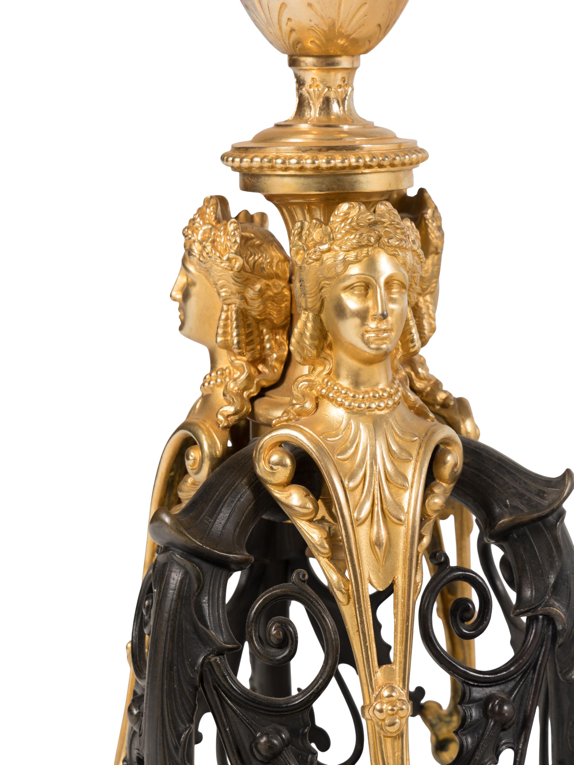 A Pair of French Neoclassical Style Gilt and Patinated Bronze Marble-Top Tables