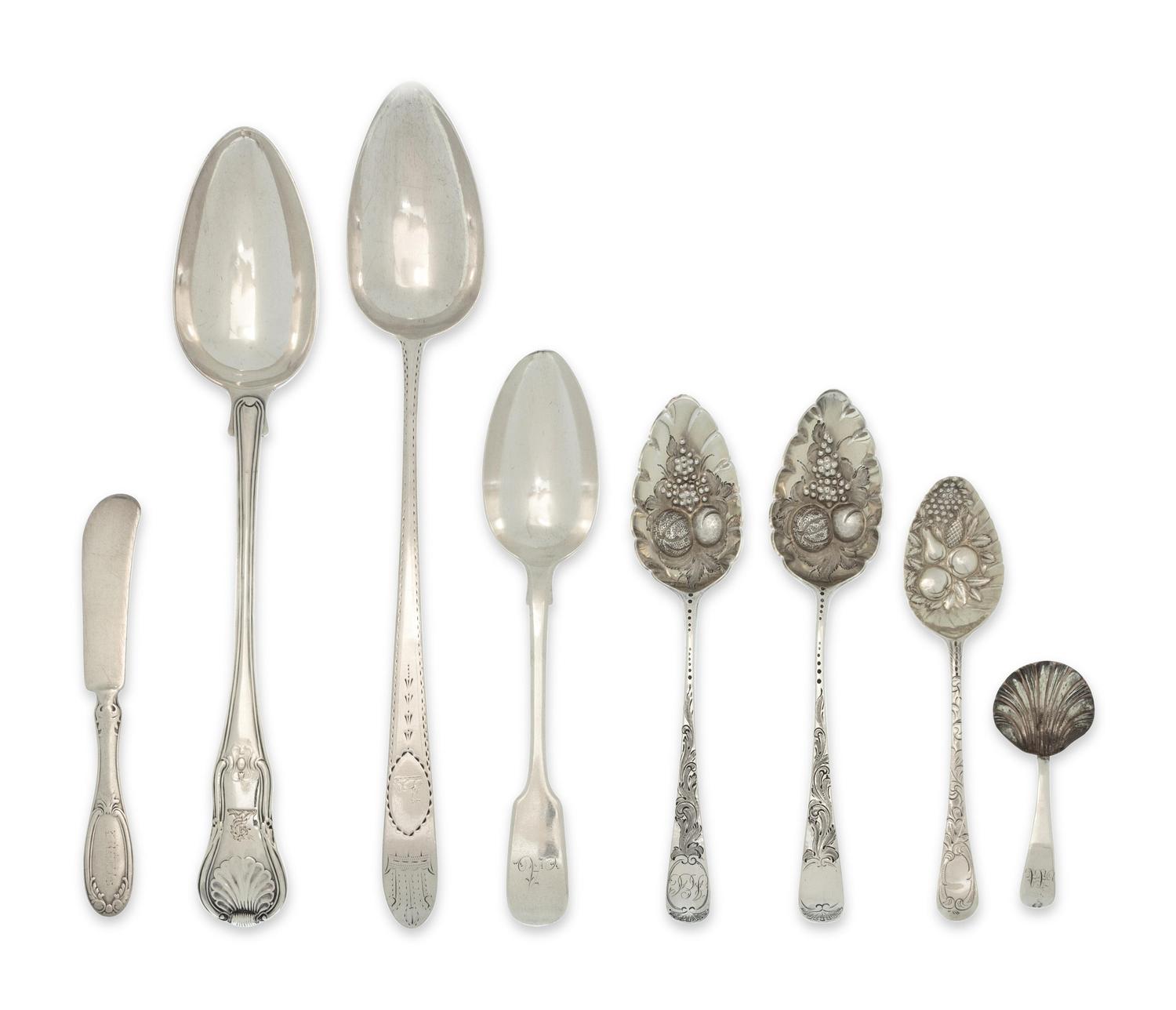 A Collection of Eight English Silver Flatware Articles