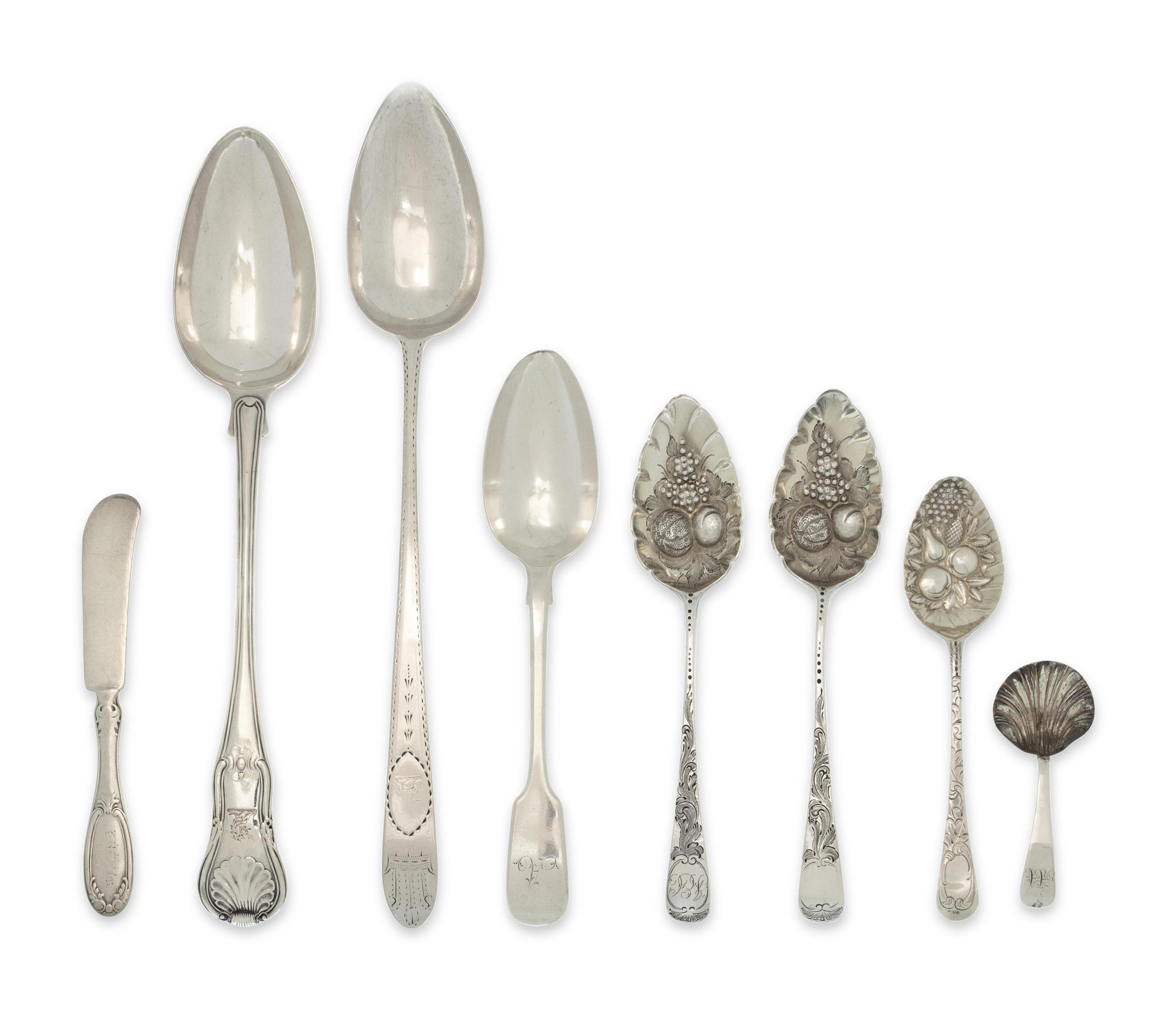 A Collection of Eight English Silver Flatware Articles