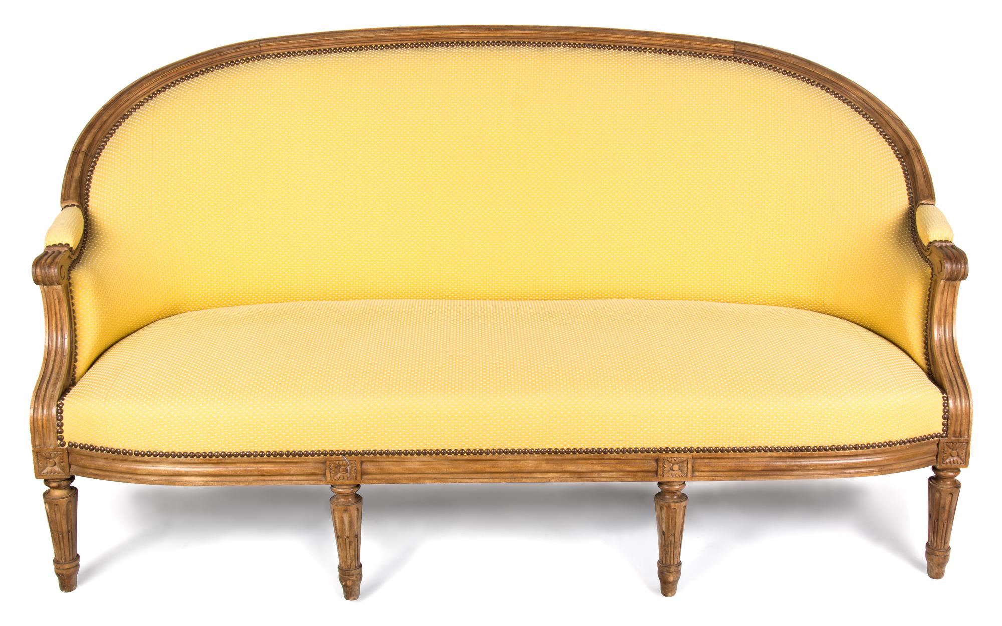 A Louis XVI Style Carved Walnut Canape Height 35 x width 69 x depth 32 inches. — LATE 18TH/EARLY 19TH CENTURY