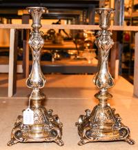 A Pair of Continental Silver-Plate Candlesticks. Height 14 1/4 inches.