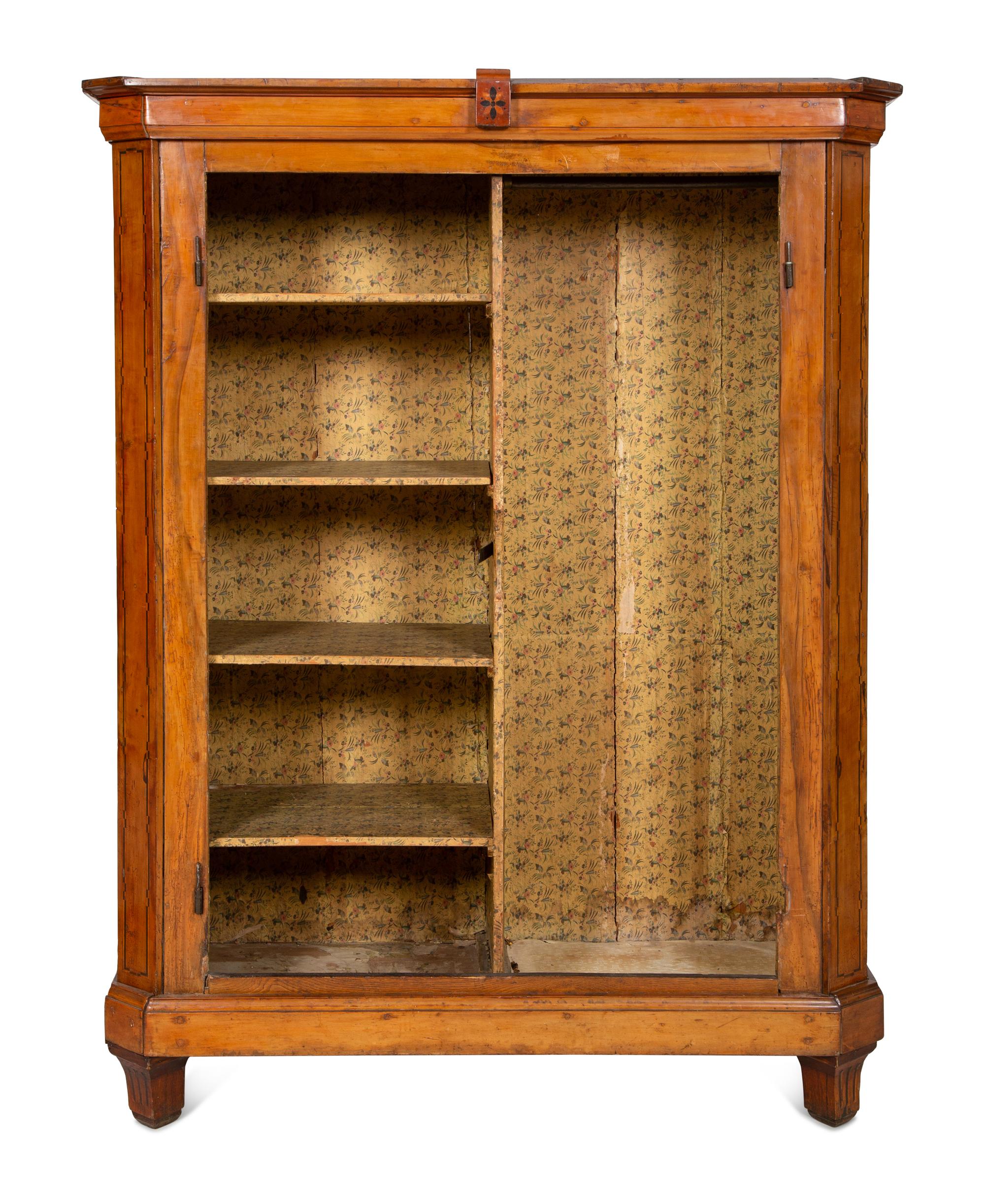 A Continental Olivewood Armoire