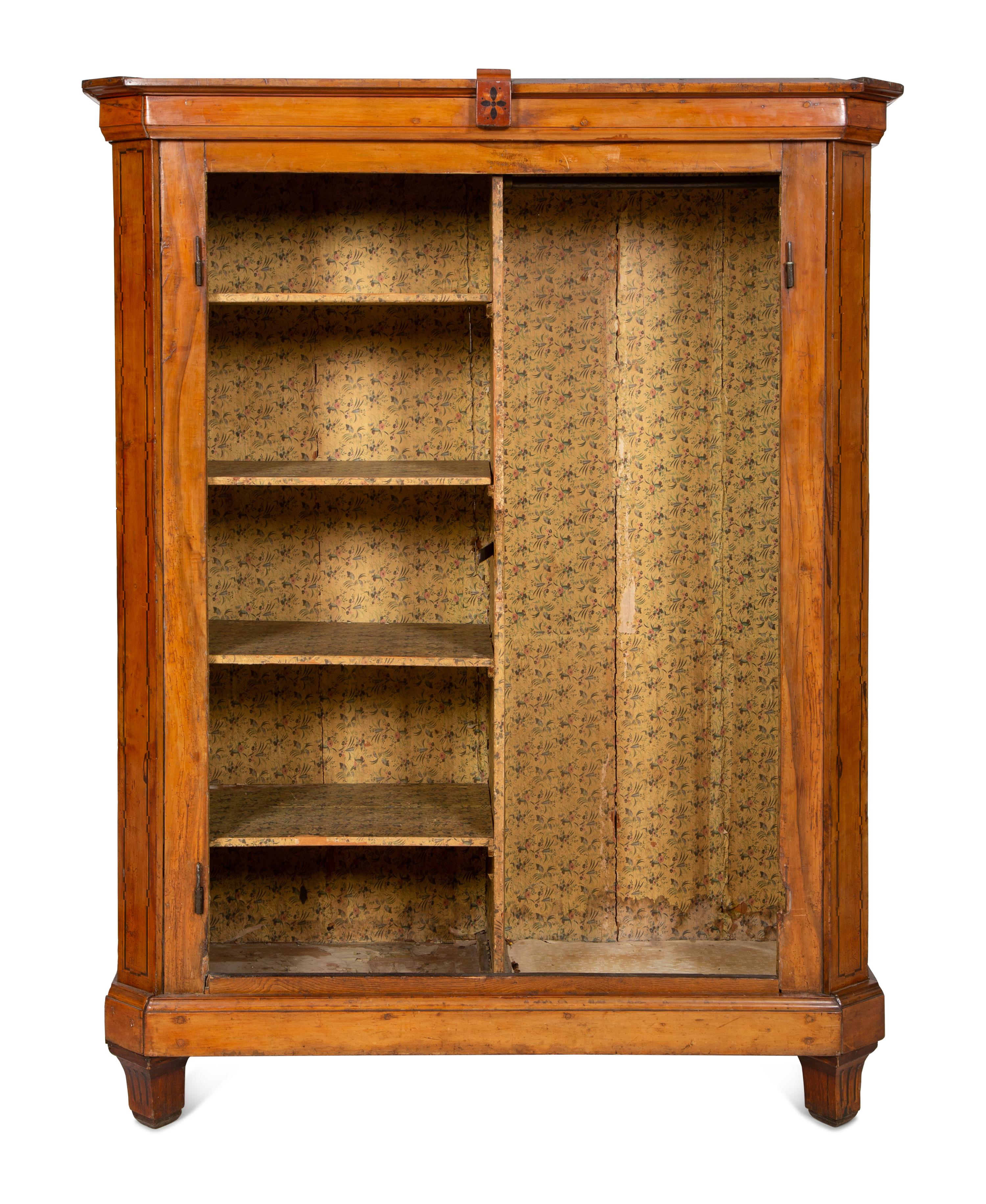 A Continental Olivewood Armoire