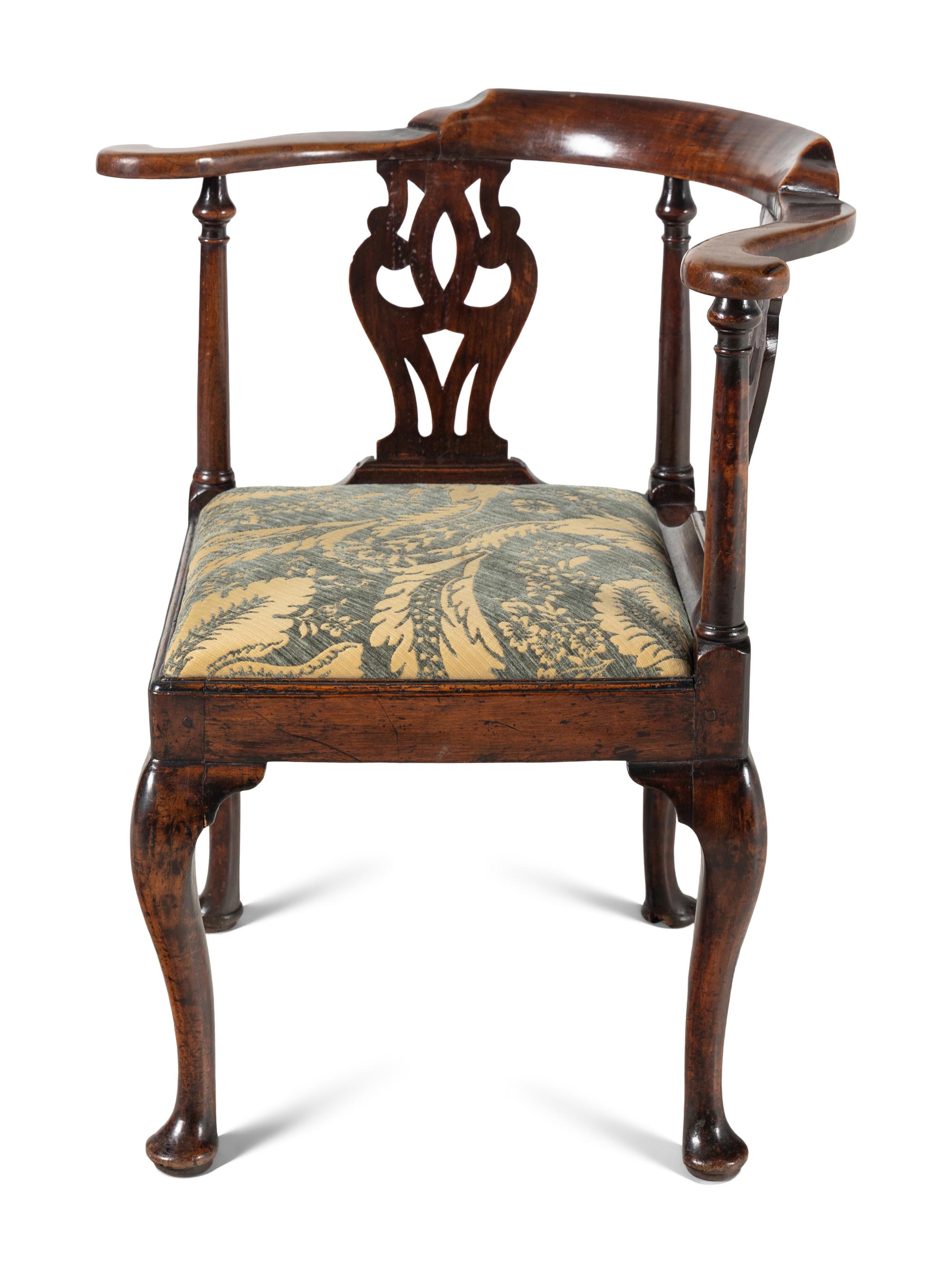 A George III Mahogany Corner Chair