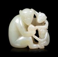 Three Chinese Celadon Jade Carvings of Monkeys