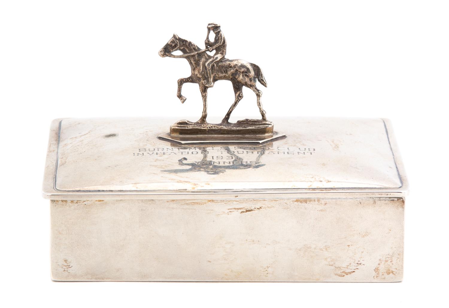 An American Silver Cigarette Box, Webster Co., North Attleboro, MA, the hinged lid having a mounted figure of polo player on pony and i