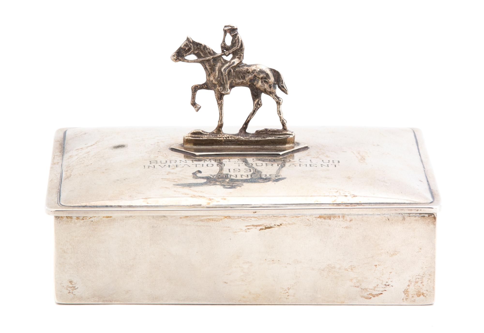 An American Silver Cigarette Box, Webster Co., North Attleboro, MA, the hinged lid having a mounted figure of polo player on pony and i