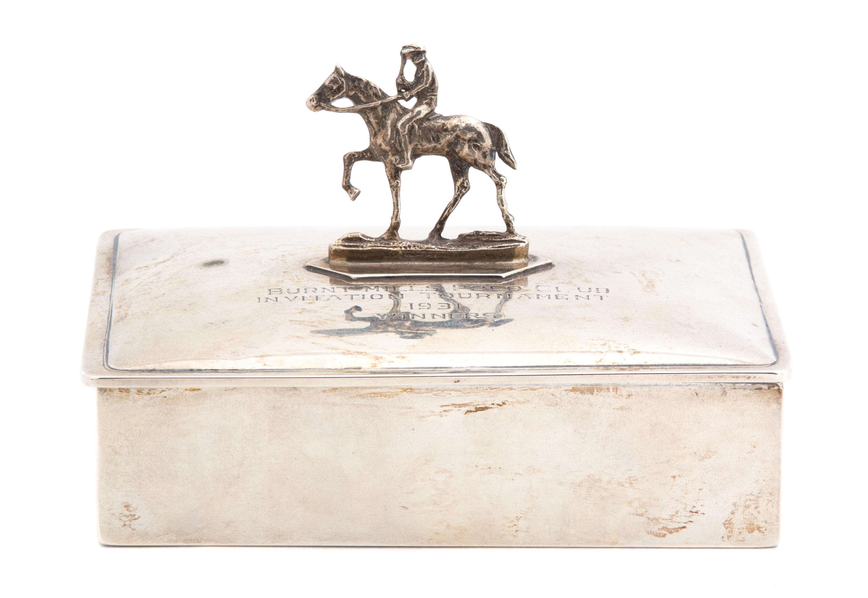 An American Silver Cigarette Box, Webster Co., North Attleboro, MA, the hinged lid having a mounted figure of polo player on pony and i