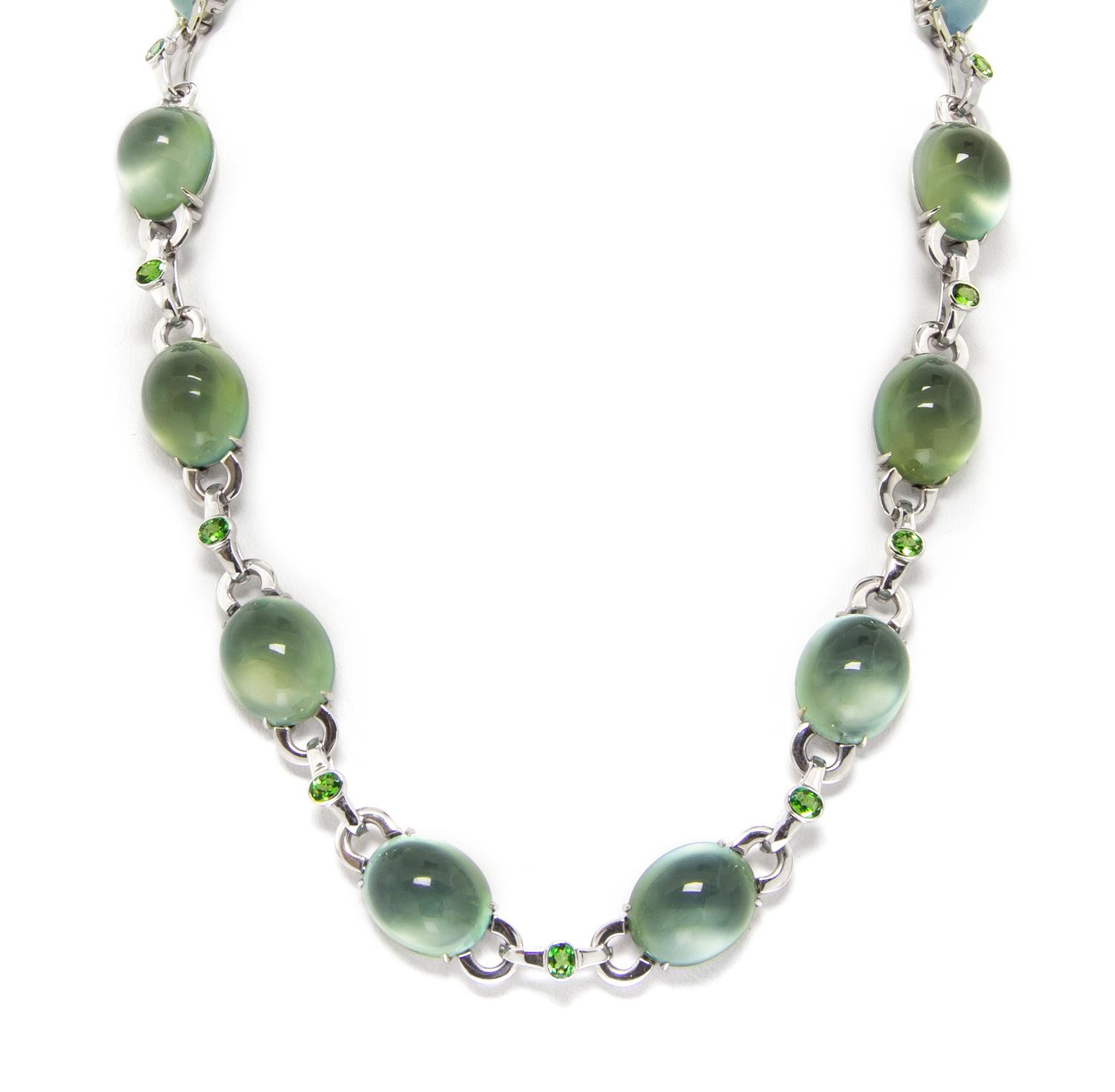 An 18 Karat White Gold, Prehnite, Green Tsavorite Garnet and Diamond Demi Parure, 65.40 dwts.
