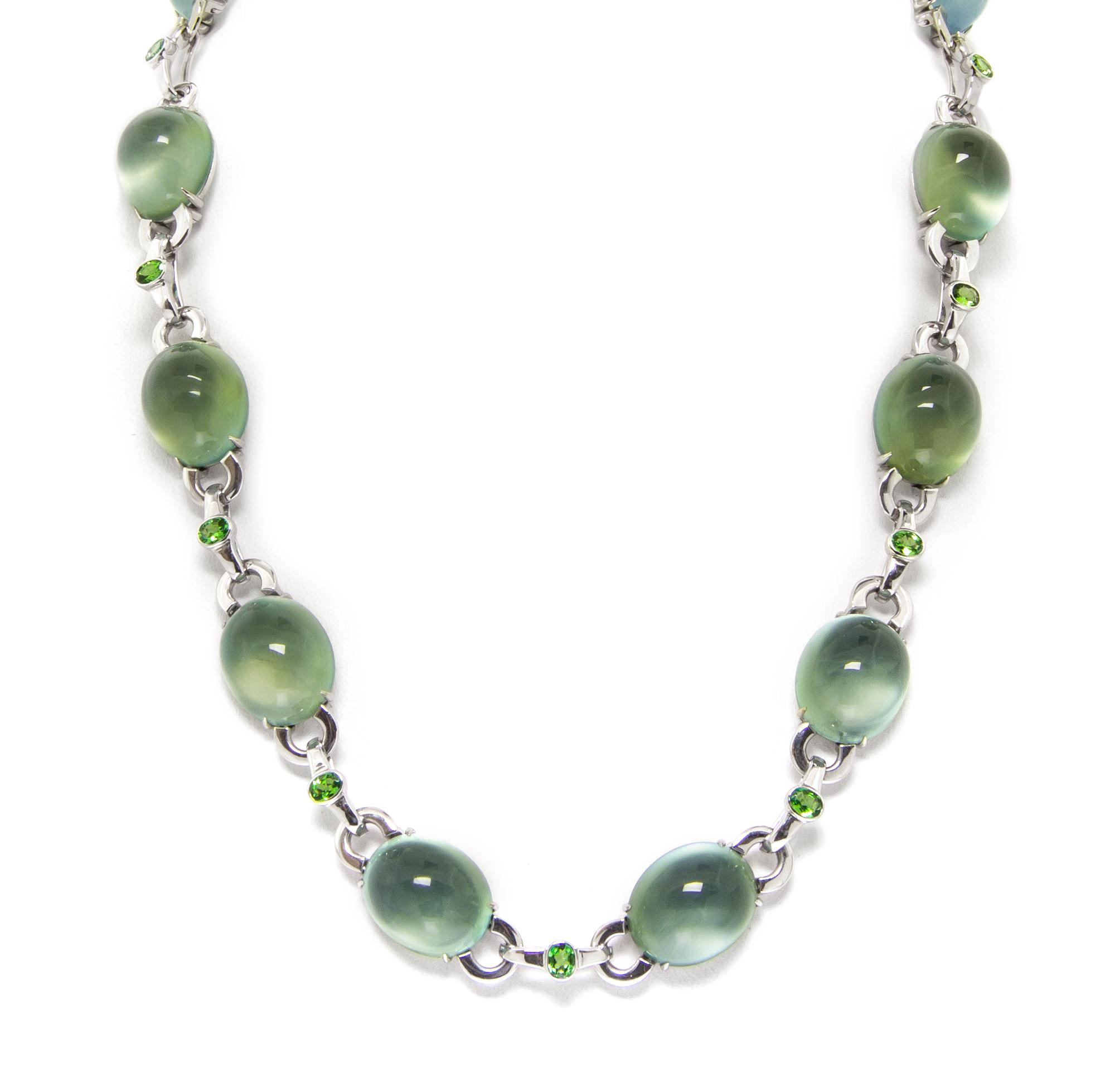 An 18 Karat White Gold, Prehnite, Green Tsavorite Garnet and Diamond Demi Parure, 65.40 dwts.