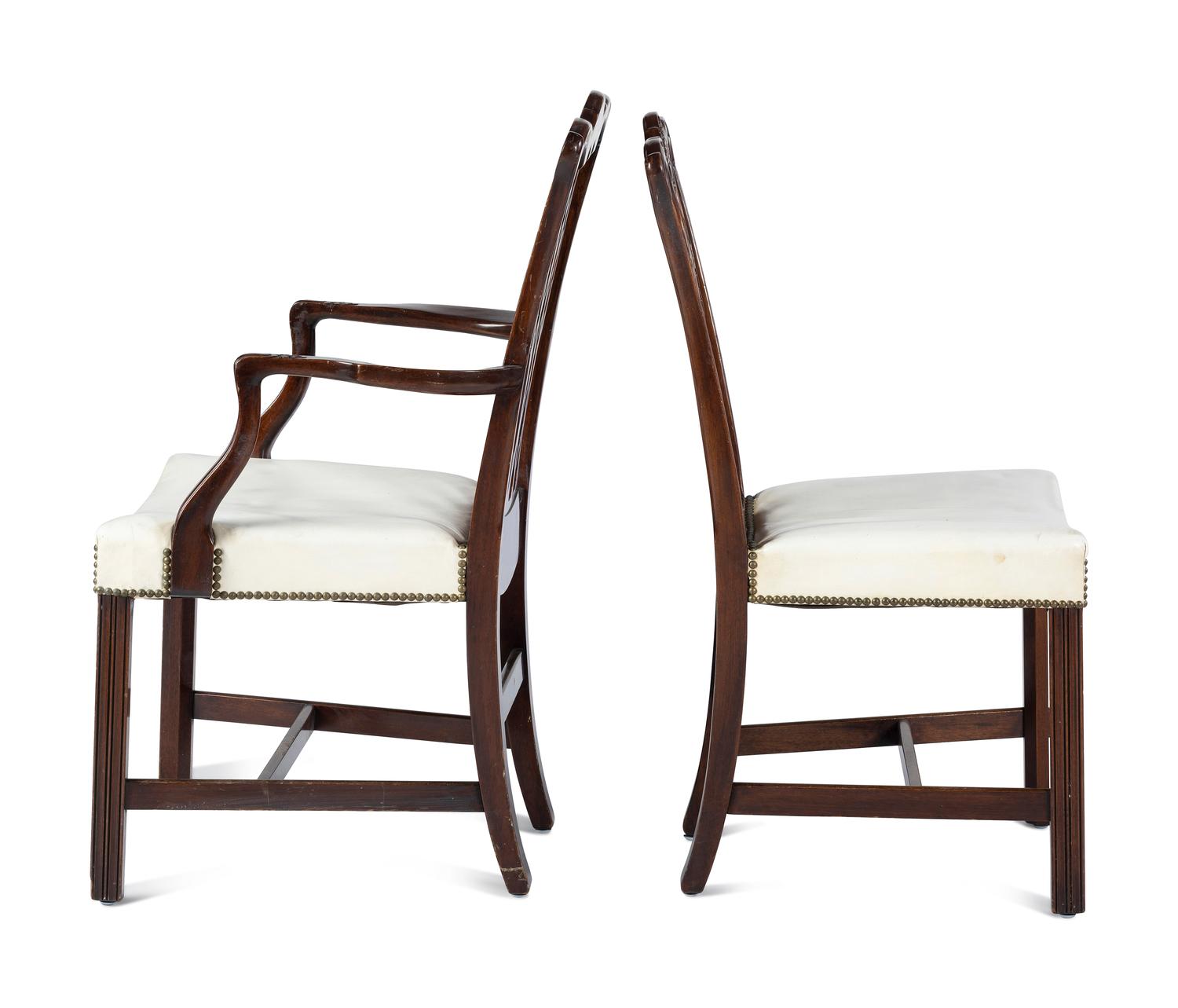 A Set of Six Chippendale Style Carved Mahogany Dining Chairs