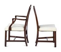 A Set of Six Chippendale Style Carved Mahogany Dining Chairs