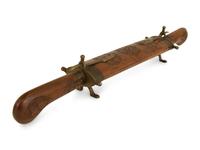 An Indian Carved Hardwood and Brass Dagger and Display Sheath