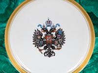 A Set of Sixteen Russian Porcelain Dinner Plates
