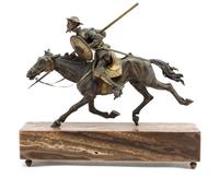 A Continental Gilt and Patinated Bronze Figural Group Height overall 16 1/2 x width of base 19 1/2 inches.