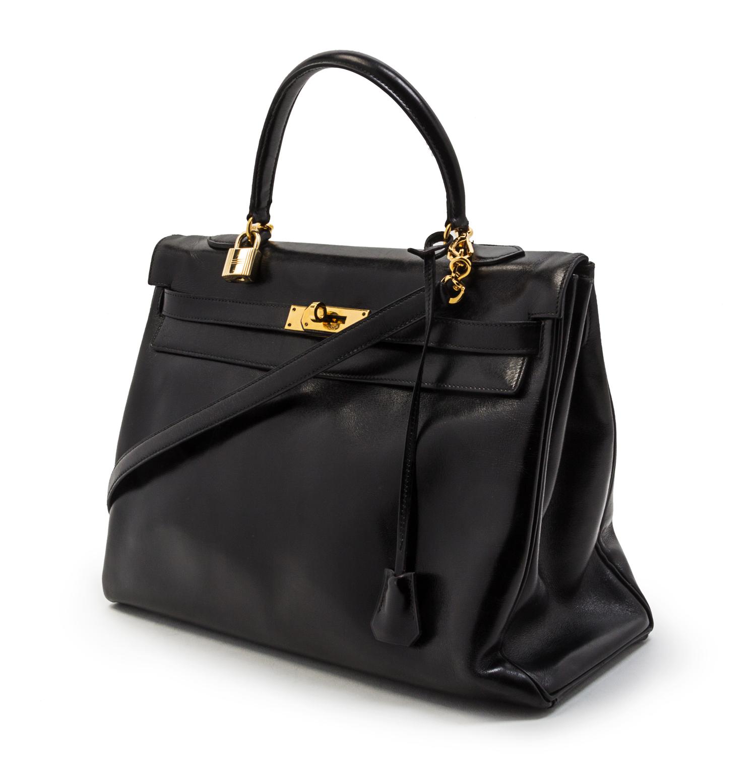 An Hermes 35cm Black Leather Kelly Bag, 14 x 8 x 7 inches.