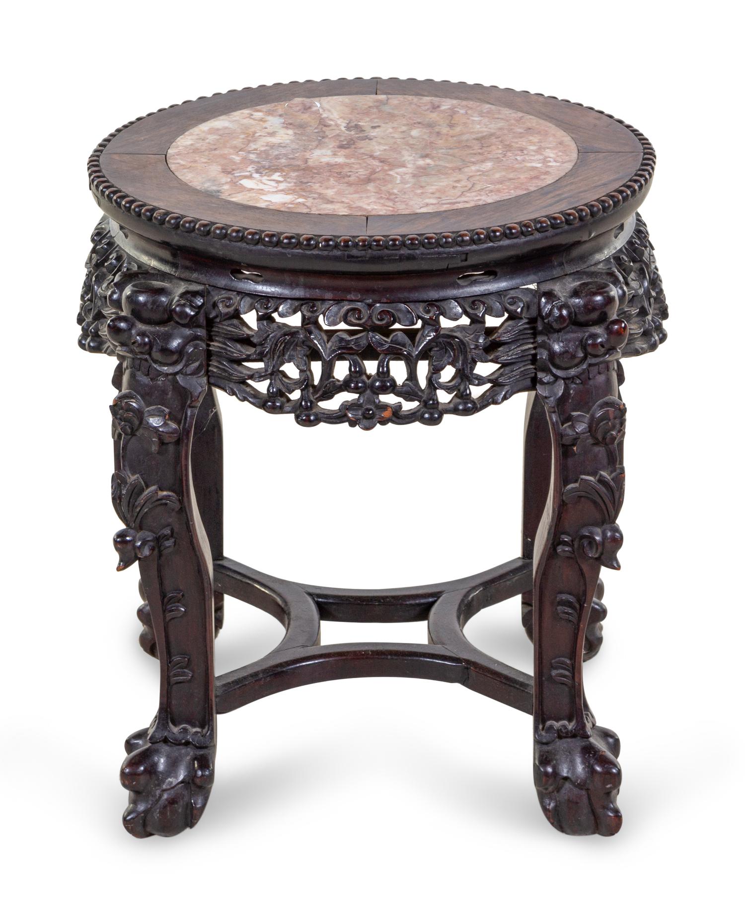 A Chinese Carved Hardwood and Marble Inset Jardiniere Table