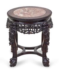 A Chinese Carved Hardwood and Marble Inset Jardiniere Table