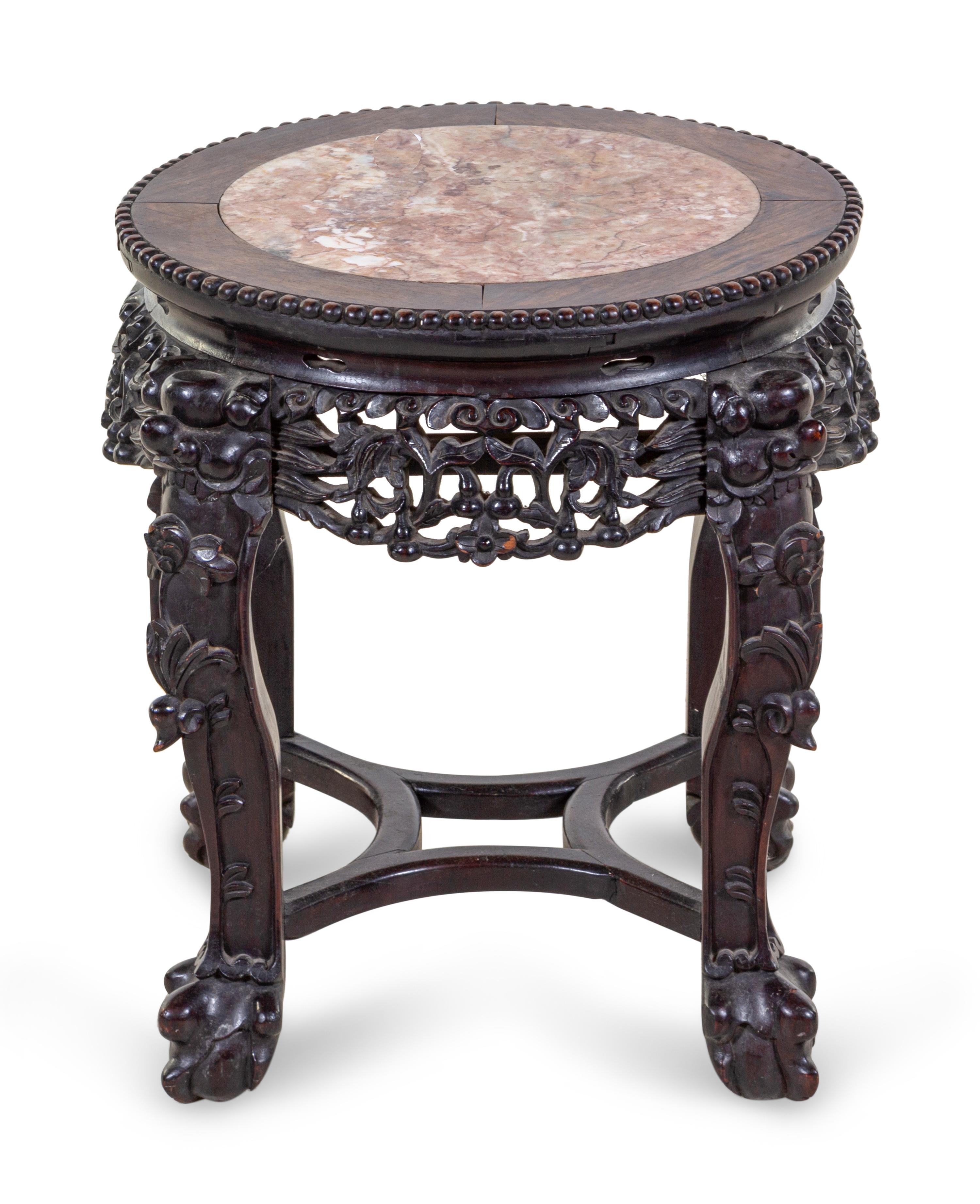 A Chinese Carved Hardwood and Marble Inset Jardiniere Table