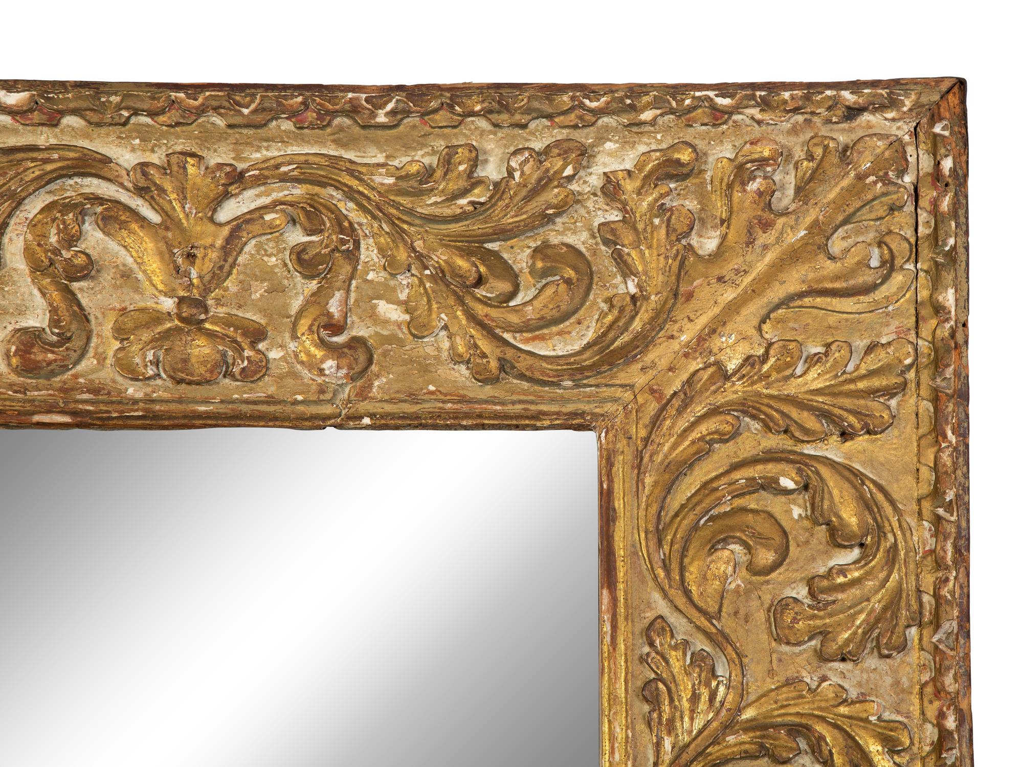 A Continental Rococo Style Foliate Carved Giltwood Framed Floor Mirror — 18TH/19TH CENTURY