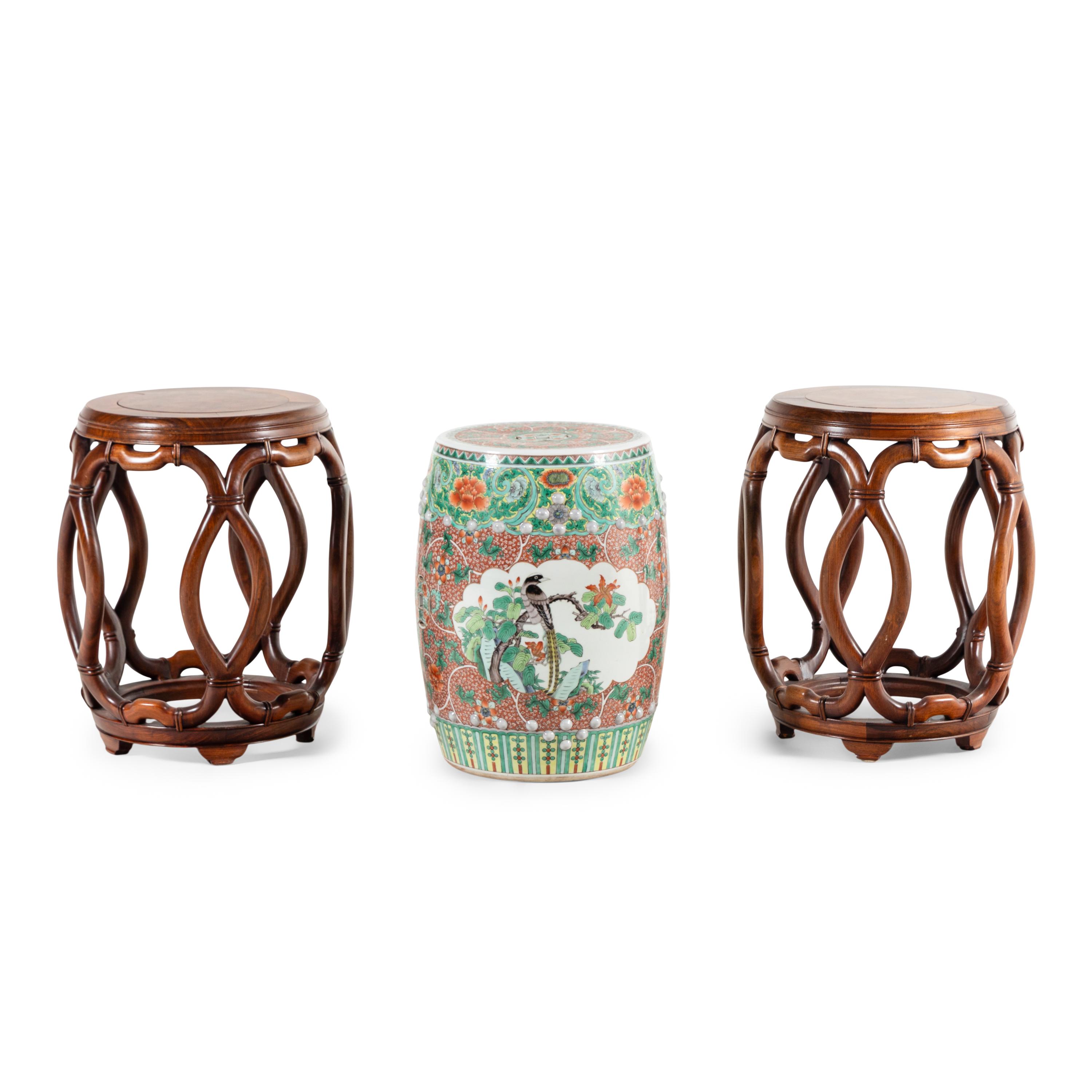 A Pair of Chinese Burlwood Top Hardwood Garden Stools and a Famille Rose Porcelain Garden Stool, Gudeng, 20th Century 近代 鼓凳一組三件