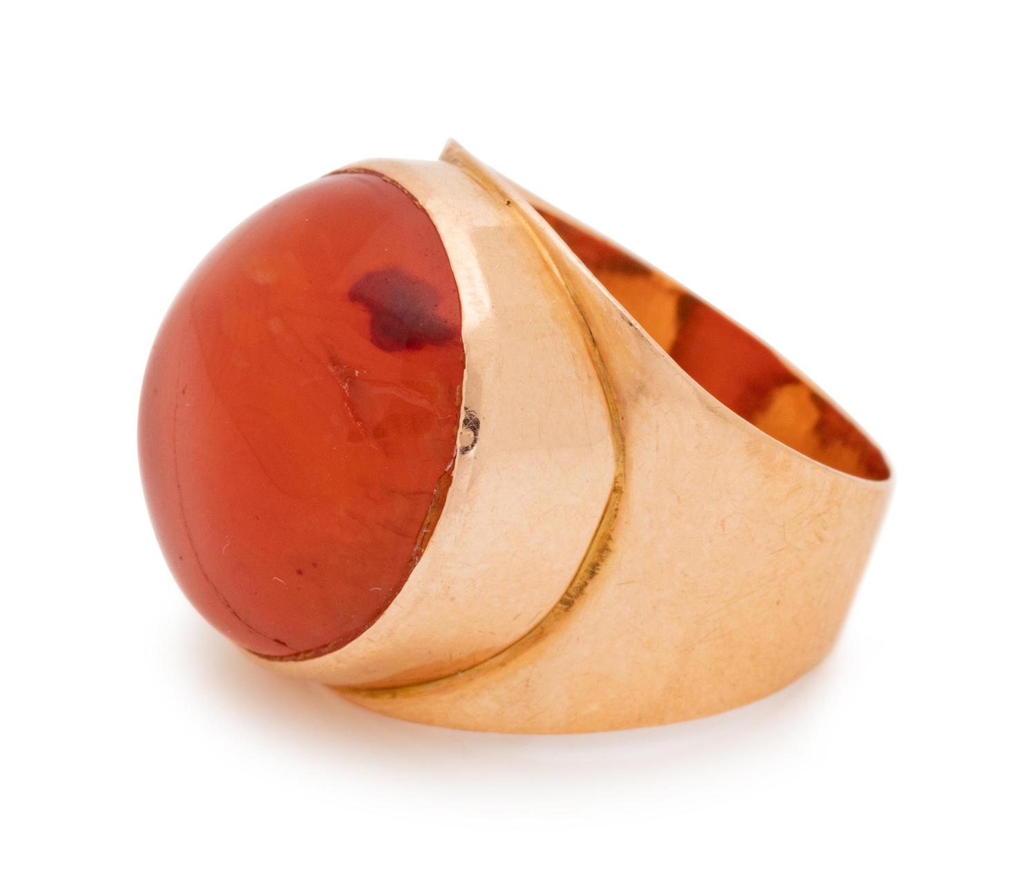 A Rose Gold and Red Hardstone Ring,