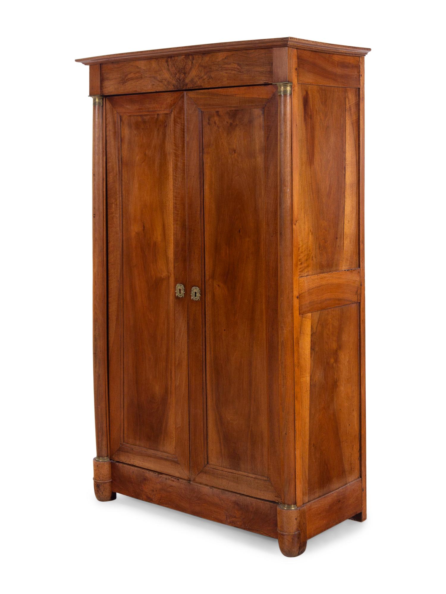 A Louis Philippe Gilt Metal Mounted Walnut Armoire