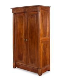 A Louis Philippe Gilt Metal Mounted Walnut Armoire