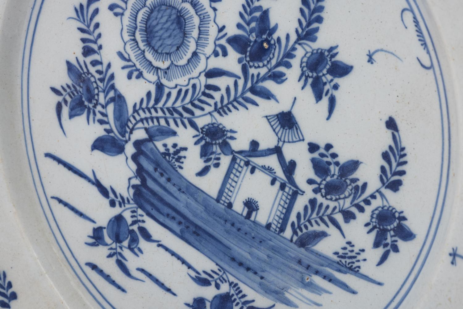 A Delft Pottery Charger and a Chinese Export Kraak Ware Charger