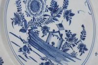 A Delft Pottery Charger and a Chinese Export Kraak Ware Charger