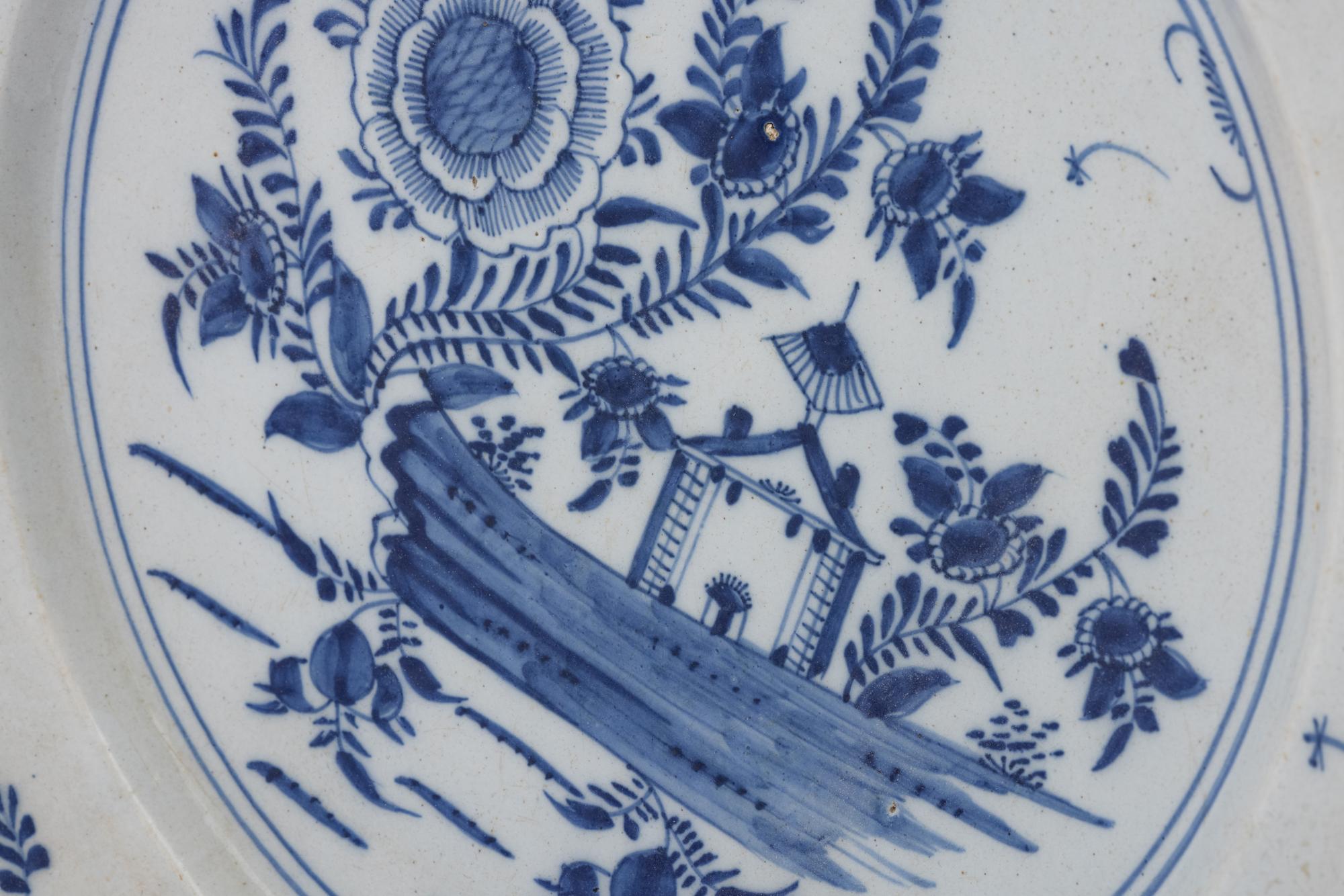 A Delft Pottery Charger and a Chinese Export Kraak Ware Charger