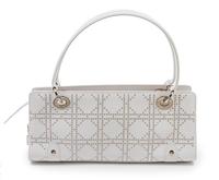 A Christian Dior Lady Dior White Leather Studded Tote, 12 1/2 x 5 x 4 inches.